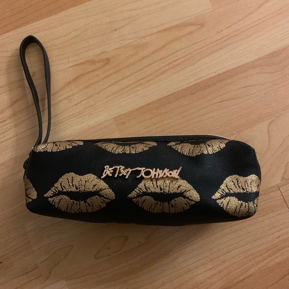Betsy Johnson black and gold lips make up bag